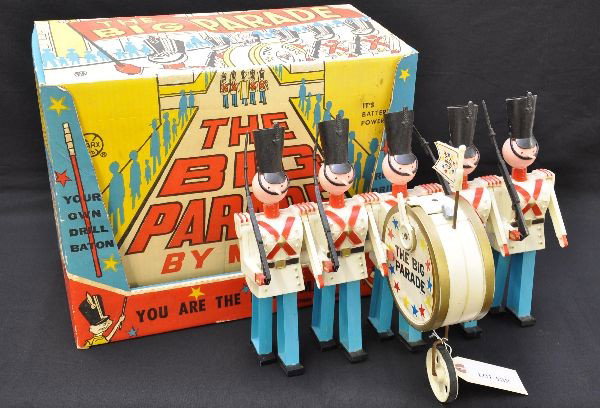 Boxed Marx The Big Parade: This classic toy is in great shape! Hard plastic, 15" wide, battery operated, functional, marches forward and reverse, drums sound in forward, original instructions, two extra guns and a great origina