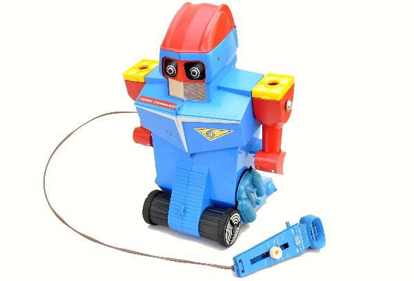 Ideal Robot Commando: Hard plastic, 19" tall, battery operated, mechanism not functioning at time of test but mechanical parts work, missing ping pong balls. Clean with minor wear to stickers, C7+