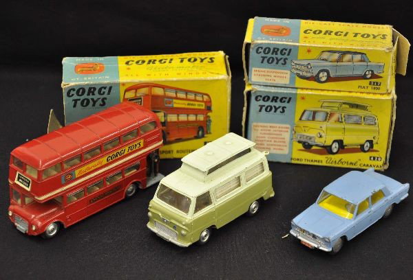 Boxed Corgi 217, 420 and 468: 217 Fiat 1800, 420 Ford Thames airborne caravan, 468 Routemaster bus with Corgi Classics decal. All show light to moderate playwear with worn original boxes, C7+
