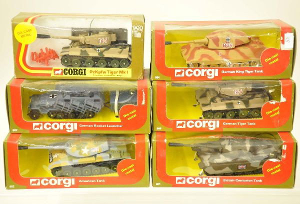 6 Boxed Corgi Military Vehicles: 902 American tank, 2 different #900 Tiger tanks, 901 British Centurian tank, 907 German rocket launcher, 904 German Tiger tank. Vehicles are new in boxes with inserts, C9