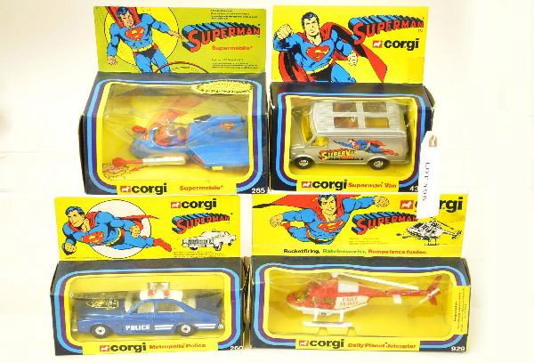 4 Boxed Corgi Superman Vehicles: 435 Superman van, 265 Supermobile, 260 Metropolis police, 929 Daily Planet jet copter. Vehicles are mint, original boxes with inserts, C9