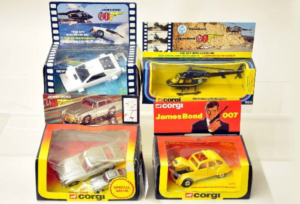 4 Boxed Corgi 007 Vehicles: James Bond 007 No. 1361 Aston Martin 2 car set, #272 Citroen 2CV, 926 Stromberg helicopter, 269 Lotus Esprit. Vehicles are mint, boxes show minor wear, C9