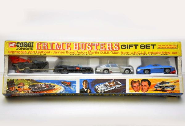 Unusual Boxed Corgi Junior Gift Set 308: Crime Busters Set includes Batmobile and batboat, James Bond Aston Martin, and Man from U.N.C.L.E. missile firing car. Factory sealed, C10
