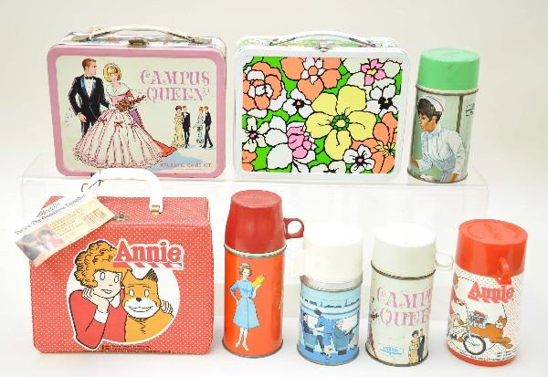 Girly Lunch Box and Thermos Lot: Annie vinyl by Aladdin 1981 with thermos and original store tag, like new; Floral, Ohio Art 1971, has some light oxidation spots one end; Campus Queen, King-Seeley 1967 with metal thermos, no game pie