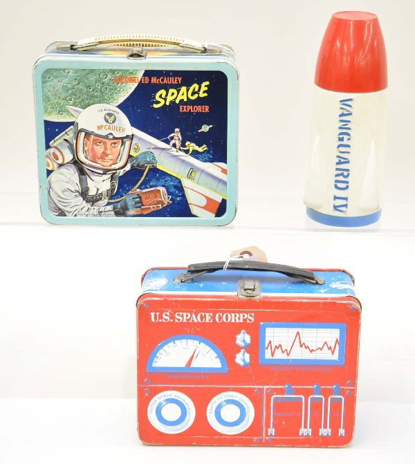 Space Theme Lunch Box Lot: Colonel Ed McCauley Space Explorer by Aladdin Industries 1960 shows light wear; Space Explorer with rocket thermos, by Universal 1969. Cap has 1" crack and box shows moderate wear.