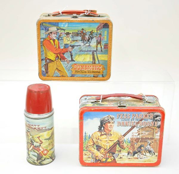 Western Theme Lunch Box & Thermos Lot: 1950s Davy Crockett dome thermos; Gunsmoke, Aladdin Industries 1959; Fess Parker Daniel Boone TV Show, King-Seeley 1965. All show light to moderate wear.