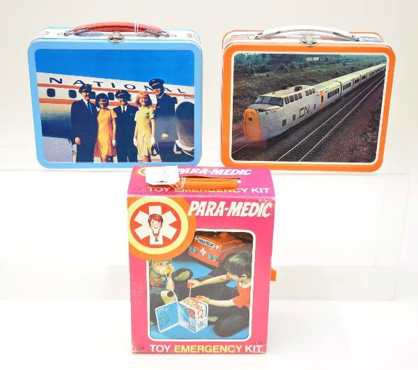 Lunch Box Lot: Unusual Ohio Art Para-Medic Emergency Kit utilizing a lunch box as its case. Mint and still in sleeve; Ohio Art 1968, National Airlines in like-new condition; CP Rail Box, Ohio Art 1970, also like new