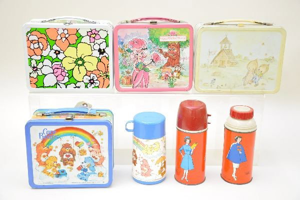 Girly Lunch Box and Thermos Lot: Care Bears, Aladdin Industries 1983 with plastic thermos; Betsy Clark, yellow variation, King-Seeley 1976; two Junior Nurse dome thermoses, one missing cup, one cup broken; Rose-Petal Place, Aladdin I