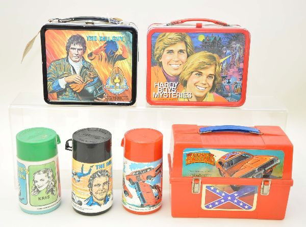 TV Themed Lunch Boxes: The Fall Guy, Aladdin Industries 1981 with plastic thermos and original store tag, near mint; Hardy Boys Mysteries, King-Seeley 1977; Charlie's Angels plastic thermos; Dukes of Hazzard plastic dome, A