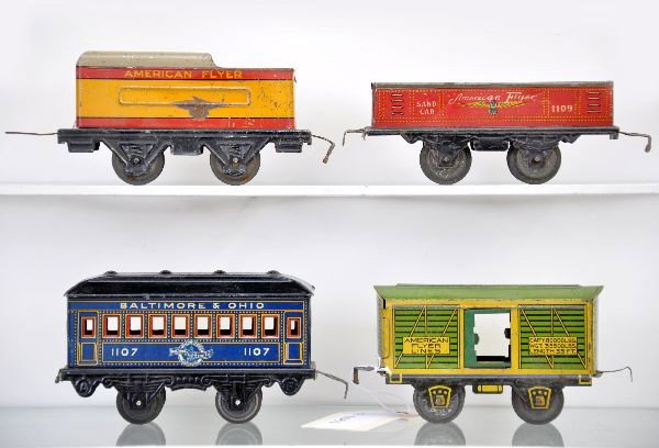 4 pc. Pre-War American Flyer Lot: Hummer stock car; Hiawatha tender (C5); scarce early 1109 sand car, circa 1915; 1107 B&O Pullman. Otherwise, shows light to moderate playwear, C6-7 The auction containing on the secondary lots will be