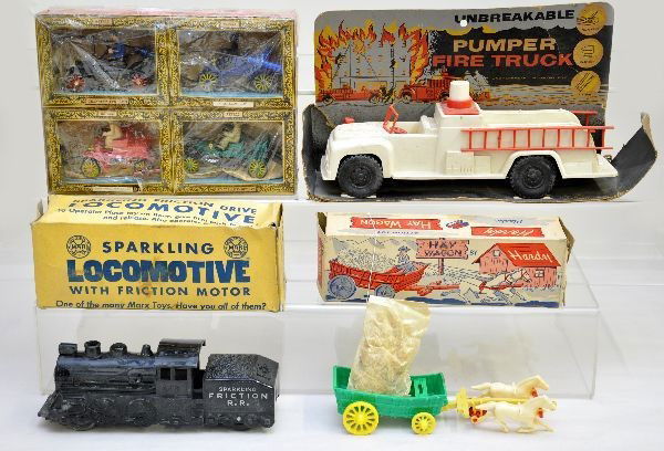 Boxed Vintage Plastic Toy Lot: Hardy hay wagon, 10" long, new in box; Marx sparkling locomotive, friction; Plastic Toy Company fire engine on worn card, needs a cleaning; 4 Revell action miniatures, all have original boxes and are