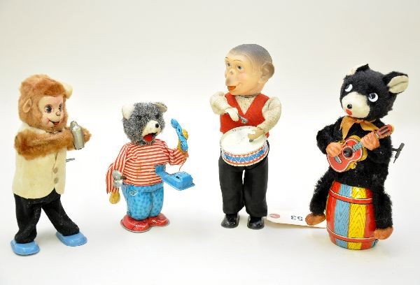 Vintage Wind-Up Toys: 9 1/2" drumming monkey; 8" bartender monkey; 6 1/2" phone answering bear (great action, phone rings, arm raises, talks, then ends call) has some wear on back of head; 9" guitar playing bear with strum