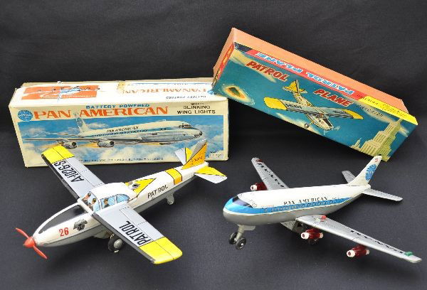 Boxed Japanese Tin Airplane Toys: Haji Japan, Pan American Jet, 13" wing span with blinking lights, sound and stop-and-go action; 14" Cessna style patrol plane, friction with prop action. Both are like new with original boxes, C9
