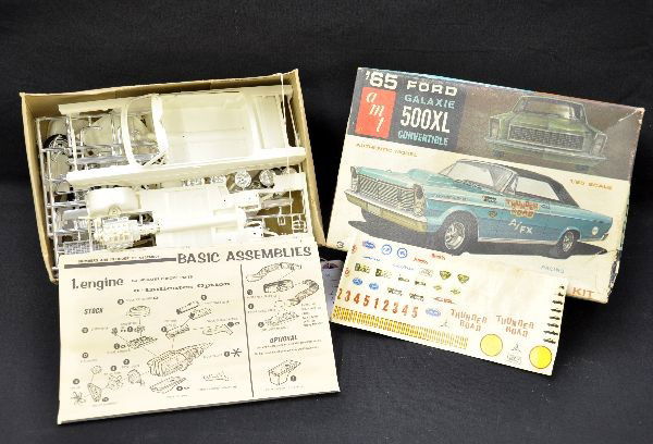 AMT 1965 Ford Galaxie Model Kit: 1/25 scale, as-new, unbuilt with parts on trees & instructions, original box shows some wear. Otherwise, C9 scarce kit!
