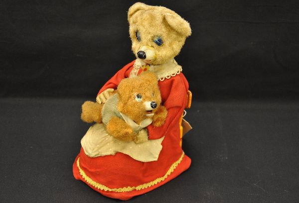 Marx Spanking Baby Bear Battery Toy: Fairly clean, 9" tall, battery operated, functional (not guaranteed),Mama's head turns and eyes as well, spanks baby and baby moves limbs, cries and repeats, shows light playwear, C7+