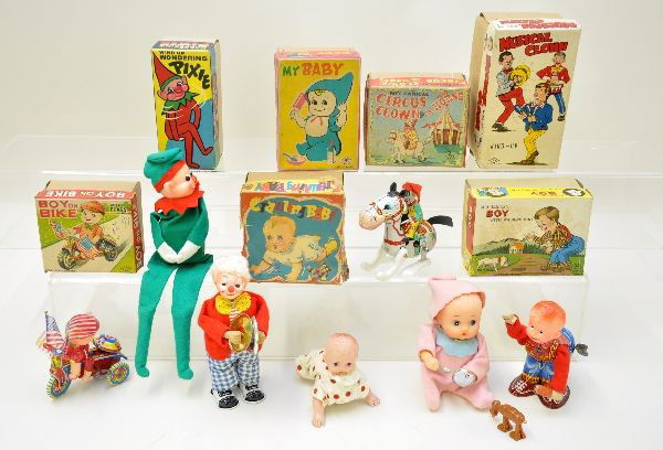 Boxed Japanese Wind-Up Toys: TM My Baby; Frankonia Wandering Pixie; TN musical clown; Elvin boy on bike; Mikuni circus clown on horse; Suzuki crawling baby; GR boy with walking dog. All are near mint and have their original boxes