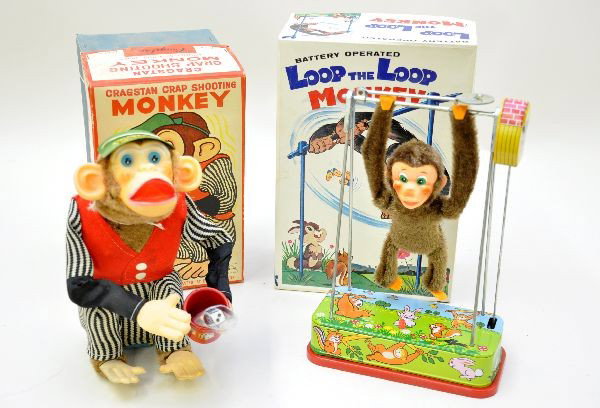 Boxed Monkey Battery Toys: TN Japan Loop the Loop monkey with insert; Alps crap shooting monkey, functional (not guaranteed), with original tin visor, pair of dice & instruction tag. Both are like new with inserts and original 