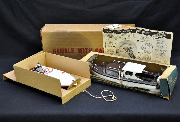 Boxed Boat Toys: Wen-Mac gas powered racing boat, plastic, 12" long with instructions and inserts, near mint, C9-10; Eldon 14" pleasure boat with battery-operated outboard motor, untested, worn original box, shows lig