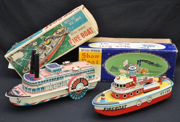 Boxed Battery Boat Toys: MT Japan, 13" Show Boat, drive functions, but no whistle or smoke; SAN Japan Fire Boat, major battery damage for parts only. Both have original boxes, otherwise C7