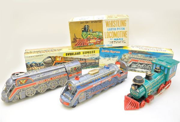 Boxed Battery Toy Trains: MT Japan, Overland Express, 16" long; Marx whistling lighted locomotive; Chadwick Japan, Action Express, all function, Action Express stopped working during test, but motor ran. All have original boxe