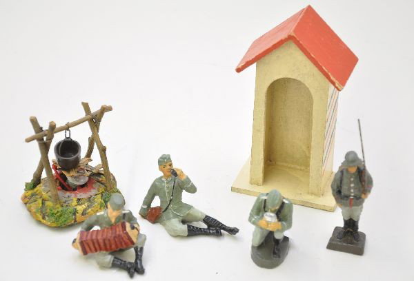 Composition Soldier Lot: Schusso century with century box, Elastolin soldier drinking, Lineol accordion player, soldier at rest and cooking fire with electric light. All show very light wear, C8+