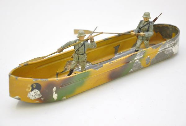 Lineol German Barge With Crew: 10 1/2" tin barge, paint is flaking 40%, includes two oarsmen which show moderate wear. Figures are C6