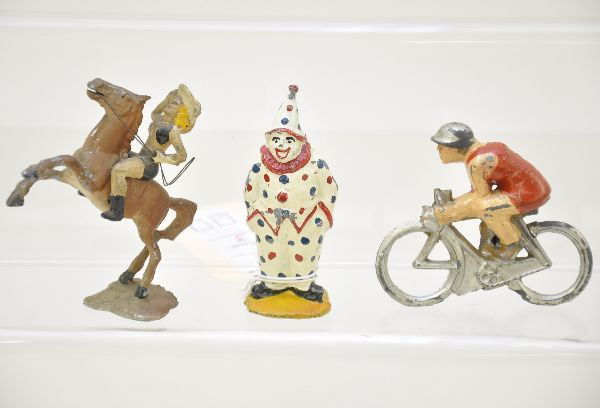 Unusual Figure Lot: Dimestore bike racer, missing stand; unusual clown figure; and woman riding show horse rodeo piece, made in USA. Otherwise, should clean to C7
