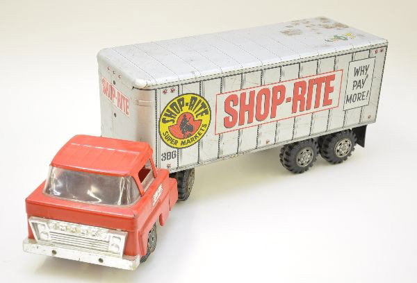 Marx Shop-Rite Delivery Truck: Tin and pressed steel, 24" long, some sticker residue on trailer sides and trailer roof has several light rust spots. Overall, shows moderate playwear, otherwise C6