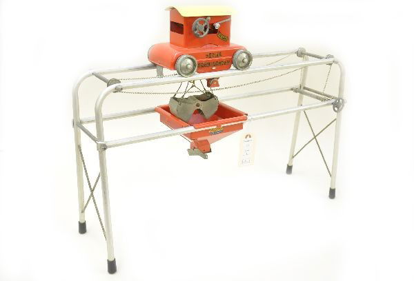 1959 Tonka Aerial Sand Loader: Clean with nice decals, mechanism functional with original clam shell, replaced roof. Otherwise, shows light playwear, C7-8