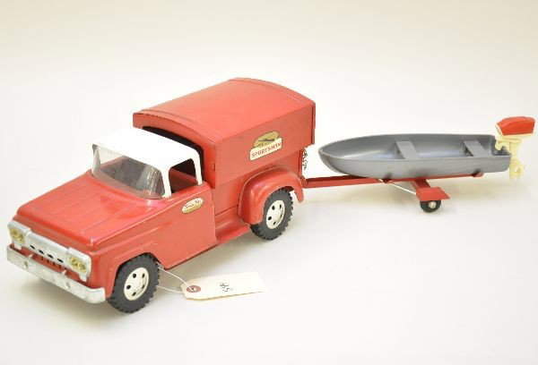 Scarce 1959 Tonka Sportsman: Overall clean with nice aged patina, but passenger rear fender on truck has moisture damage. Original trailer with boat and motor. Otherwise, appears C8
