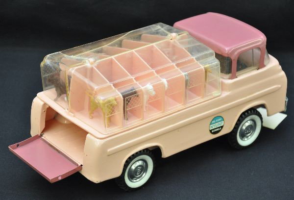 Ny-lint 6200 Kennel Truck: Clean and shiny with 12 original animals, one half of cap is broken. Otherwise, shows light playwear, C7+