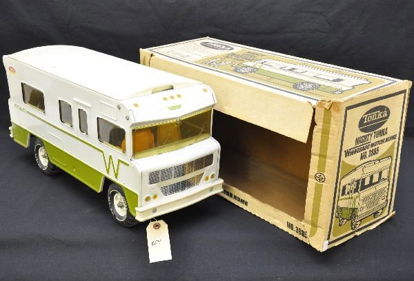 Boxed Tonka 3885 Winnebago: Circa 1970's, pressed steel, plastic wheels and interior, 22" long. Shows signs of use, but no paint chips. Worn original box, should clean to C8