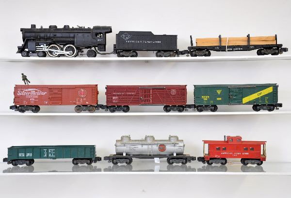 American Flyer Steam Freight Set: 307 Atlantic steam loco & tender; 929 stock car; 970 operating Silvermeteor boxcar; 926 Gulf tank car; 931 T&P gondola; 922 GAEX boxcar; 926 NH flat with lumber (missing 2 stakes); 904 caboose. Otherw