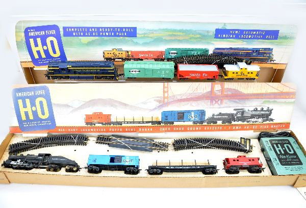 Boxed American Flyer HO Sets: 30515 The Merchandiser includes 31004 PR steam switcher; 522 B&M boxcar; 527 NH lumber car; 33506 PR caboose, track, transformer, display insert & header card; Set 30517 includes 31022 C&O Alco diesel