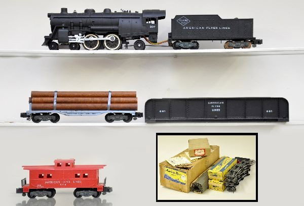 Boxed American Flyer Set K5401-T,: S-Gauge. Set includes 307 Reading Atlantic; 905 lumber car; 806 caboose, track, transformer, boxes & original set box. Shows light to moderate play wear, C7. Plus, 581 mint boxed girder bridge with in