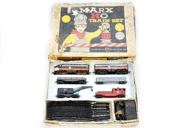 Boxed Marx HO Allstate Set 64640: NH F3 AB diesels; LV railed flat with lumber; SP gondola; NYC wrecker; NH work caboose, track, transformer, set box with insert, shows wear. Trains are like new, C8