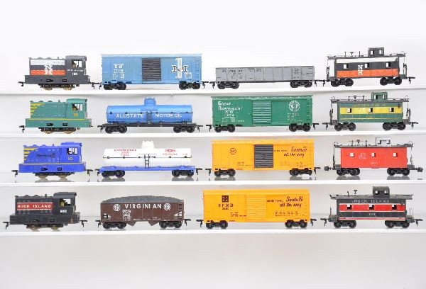 Marx HO Diesel Freight Trains: NH switcher, B&M boxcar; SP gondola; NH caboose; WP switcher; Allstate tank; GN boxcar; WP caboose; MP switcher; rocket fuel tank; Sears boxcar, NYC caboose; RI switcher; Virginian hopper; SF boxcar; 