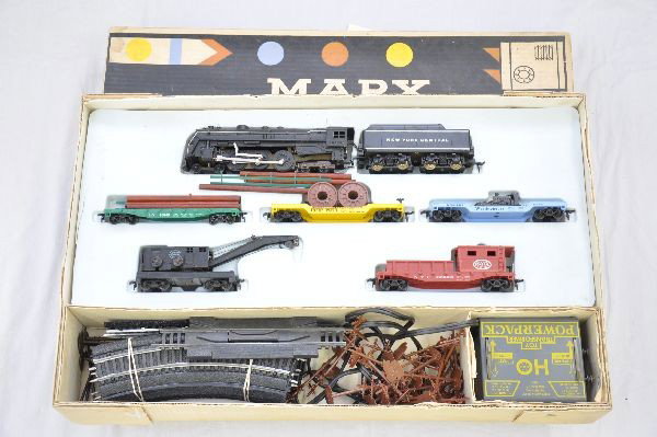 Nice Boxed Marx HO Allstate Set: Set 68750 includes 6096 NYC Hudson loco & tender; LV green railed flat with logs; Erie flat with reels, complete; WECX transformer car, no brakewheel; NYC wrecker; NYC work caboose; telephone poles; t