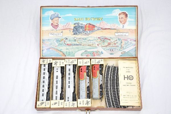 Boxed Marx HO Suitcase Set: SF F3 AA diesels, combine, coach, observation, cars are lighted, track, individual boxes, 1 is worn and suitcase set box. Trains show light to moderate playwear, C7-7+