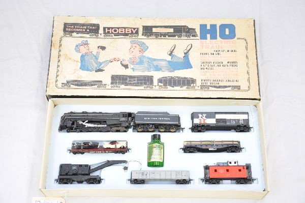 Boxed Marx HO Allstate Set 9968: Includes 6096 NYC cast Hudson loco & tender boxcar; Erie flat with autos; LV railed flat with lumber; NYC wrecker hook broken; SP gondola; NYC caboose, track, remote switches with controller, set box 