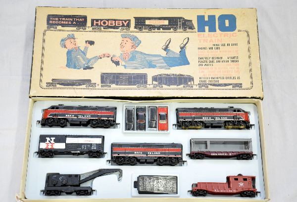 Boxed Marx Allstste HO Set 9961: Includes RI F3 ABA diesels; Erie auto loader, complete; operating NH boxcar, complete; NYC wrecker; RI work caboose, roadbed track and set box with inserts. Shows very light wear, C8