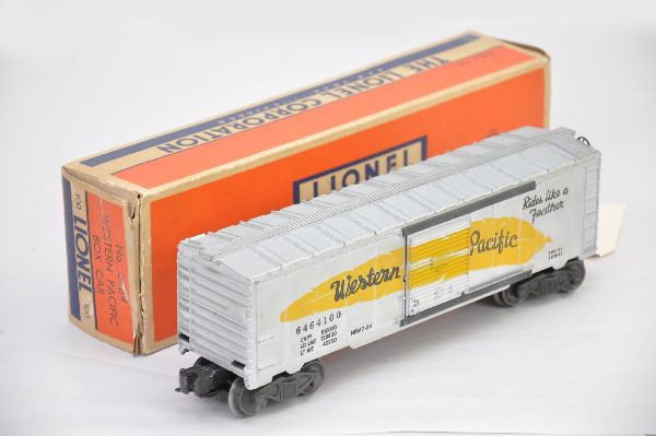 Boxed Lionel 6464-100 WP Boxcar: Scarce, short feather version, Type I body, clean original box, one flap reattached, minor tape. Shows light to moderate wear with light staining. C6+