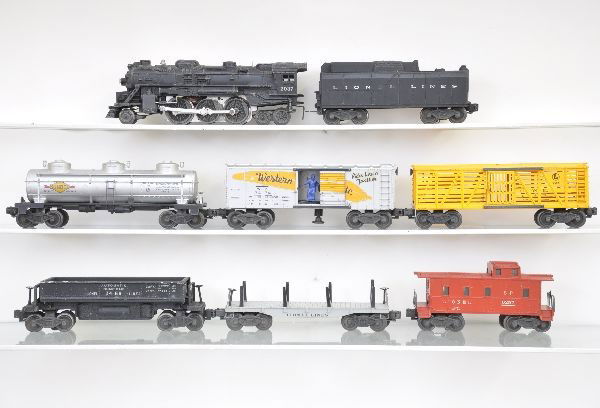 Lionel Steam Freight Set: 2037 steam loco, missing one jewel, slight bend to front step; 6026W tender, broken steps; 6415 Sunoco tank car; 3474 WP operating boxcar; 3469 coal dump; 6411 flat car only; 6656 stock car; 6257 cabo