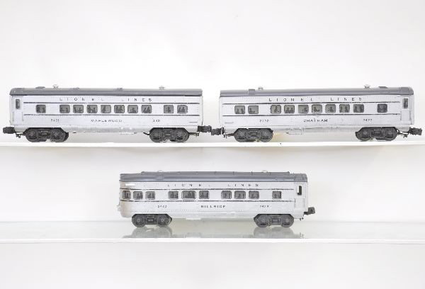 Lionel Passenger Cars: Circa 1951, 2421 Maplewood Pullman; 2422 Chatham Pullman; 2423 Hillside observation. All show moderate playwear, C6