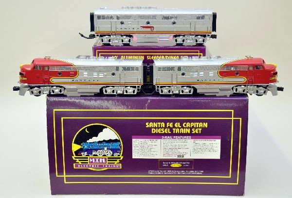 Boxed MTH El Capitan Set: 30-2153-1 train set which includes Santa Fe ABA with proto sounds and 4 passenger cars, plus 20-6122 sleeper/diner set. All shows light playwear, C7+-8