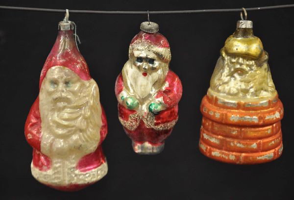 Antique Santa Christmas Ornaments: 2 3/4" Santa in chimney, 2 1/2" full body Santa and a 3" Santa body. All hand blown and painted glass with caps. All show signs of use and age.