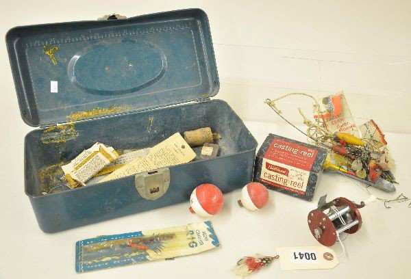 Estate Tackle Box with Tackle: This blue enameled box contains a boxed Hawthorne 60-6324 reel & one unboxed reel; 3 painted eye wood lures; 4 Seasons night crawler rig in package; 4 assorted spinners, feather lure, bobbers weights,