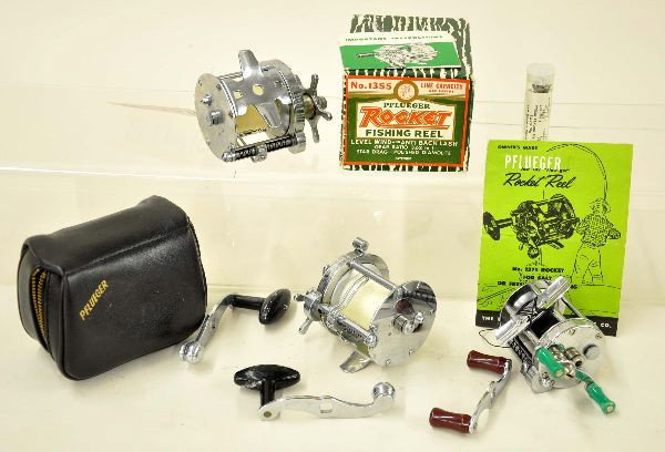 Pflueger Fishing Reel Lot: This lot contains 3 high grade fishing reels. 1355 Rocket Reel with original box & instructions; 1375 Rocket Reel with two cranks and original case; 1893 Akron Reel, also includes a 4373 parts kit wit