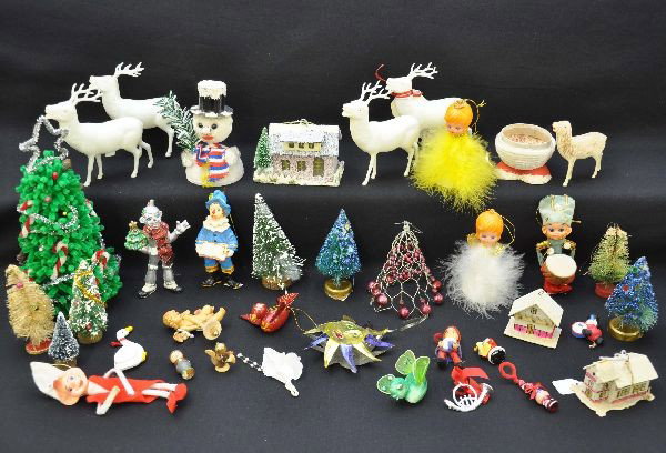 Large Group of Christmas Decorations: Nice group including candy containers, Christmas houses, paper bell ornaments, miniature trees and more! Examine photo for details.