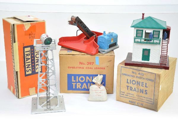 Boxed Lionel Accessories: 445 operating switch tower; 394 rotating beacon, aluminum (box rough); 397 operating coal loader with 207 coal and controller with insert. Otherwise, all have original boxes and show light playwear. S